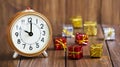 Christmas time to gift, shopping. Orange retro alarm clock and gift boxes, web banner