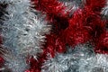 Christmas tinsel silver and red texture Royalty Free Stock Photo