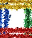 Christmas tinsel with stars as frame. Royalty Free Stock Photo