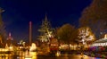 Christmas in Tivoli Amusement Park in Copenhagen, Denmark in the dark winter evening