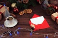 Christmas top view background. Cup of coffee, presents, ornaments Royalty Free Stock Photo