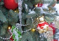 Christmas toy - golden teddy bear in a red sweater on the Christmas tree Royalty Free Stock Photo