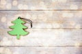 Christmas toy, green fur-tree, on old wooden background. Winter concept, new year decorations, greeting card. Flat lay Royalty Free Stock Photo