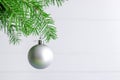 Christmas toy hanging on a branch of spruce decoration isolated on the white Royalty Free Stock Photo