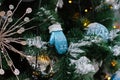 Christmas toy mitten hanging on Christmas tree Royalty Free Stock Photo