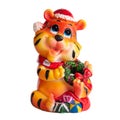 Christmas toy statuette small orange tiger cub in a hat