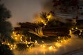 Christmas toys, garlands and interior elements in lights, home decoration for the holiday. Royalty Free Stock Photo