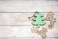 Christmas toys green fur-tree and snowflakes on old wooden background. Winter concept, new year decorations. Flat lay Royalty Free Stock Photo