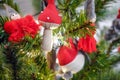 Christmas toys hanging on the branches, under the Christmas tree gifts for . Garlands are burning Royalty Free Stock Photo