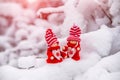 Christmas toys stand on the branches of a snow-covered fir Royalty Free Stock Photo