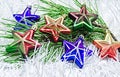 Christmas Toys stars on white decoration with branch of pine tree
