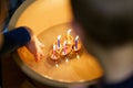 the Christmas tradition of burning candles in a walnut shell Royalty Free Stock Photo