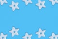 Christmas traditional cookies bakery star pattern on blue background.Concept banner frame border background for Christmas and New Royalty Free Stock Photo