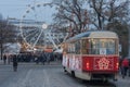 Christmas tram, market and christmas wheel at Moravian square