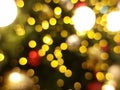 christmas tree abstract bokeh blur light circle red orange and yellow glowing flare pattern black background Royalty Free Stock Photo