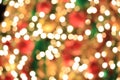 Christmas tree on abstract light golden bokeh background. Royalty Free Stock Photo