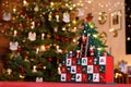 Christmas Tree Advent Calendar in Front of Christmas Tree in Christmassy Decorated Family Room