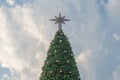 Christmas tree against blue sky