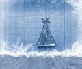 Christmas tree arranged from sticks on empty wooden deck table on sparkly blue background. Ready for product display montage Royalty Free Stock Photo