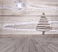 Christmas tree arranged from sticks on empty wooden deck table on sparkly grey background. Ready for product display montage Royalty Free Stock Photo