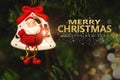 Christmas tree background and Christmas decorations with blurred, sparking, glowing and text Merry Christmas and Happy New Year Royalty Free Stock Photo