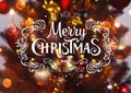 Christmas tree background and Christmas decorations with blurred, sparking, glowing and text Merry Christmas and Happy New Year.