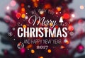 Christmas tree background and Christmas decorations with blurred, sparking, glowing and text Merry Christmas and Happy New Year Royalty Free Stock Photo