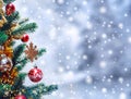 Christmas tree background and Christmas decorations with snow, blurred, sparking, glowing. Royalty Free Stock Photo