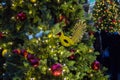 Christmas tree background and Christmas decorations. Colorful balls and garland on green fir in the evening Royalty Free Stock Photo