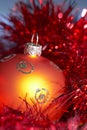 Christmas tree ball with tinsel Royalty Free Stock Photo