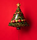 Christmas tree balloon object with gold star and ornament decoration on new year background Royalty Free Stock Photo