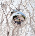 Christmas tree balls and mirroring of father and sun Royalty Free Stock Photo