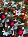 Christmas tree  balls and  Pine cones  on  tree fir branches, red ,green ,blue colored decoration and white snowflakes  ,  holiday Royalty Free Stock Photo