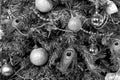 Christmas tree with baubles, peacock feather, garlands Royalty Free Stock Photo