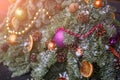 Christmas tree with beautiful ornament closeup, festive background