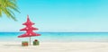 Christmas Tree On Beautiful Tropical Beach. Summer New year concept 3d render Royalty Free Stock Photo