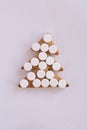 Christmas tree biscuits. White tablets. Light background