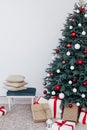 Christmas tree blue pine with gifts interior decor white room new year winter holiday Royalty Free Stock Photo