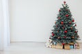Christmas tree blue pine with gifts interior new year December postcard