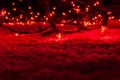 Abstract Christmas tree lights in the dark, red bokeh,blur defocused, blur defocused Royalty Free Stock Photo