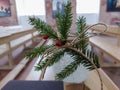 Christmas tree branch on the background of the Orthodox icon and the cross. Orthodox Church Winter - Christmas. The concept of Royalty Free Stock Photo