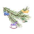 Christmas Tree Branch decorated with Xmas tree toys. Airplane, Train, Bird, Horse. Kid Wooden Decorations on Spruce Branch.