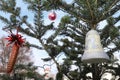 Christmas tree branch with decorations on the background of the golden dome of the Orthodox Church. Bright winter day. Winter is C Royalty Free Stock Photo