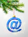 Christmas tree branch with decorative email symbol