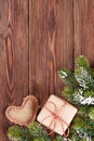 Christmas tree branch with gift box and heart toy Royalty Free Stock Photo