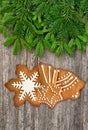 Christmas tree branch with gingerbread cookies decoration