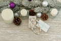 Christmas tree branches, candles and pearl necklace in a gift box Royalty Free Stock Photo