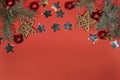 Christmas tree branches, Christmas stars and red balls. Royalty Free Stock Photo