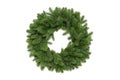 Christmas tree branches in a circle frame with space for text. Round wreath is of fir