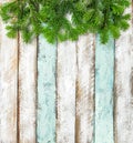 Christmas tree branches colored rustic wooden background